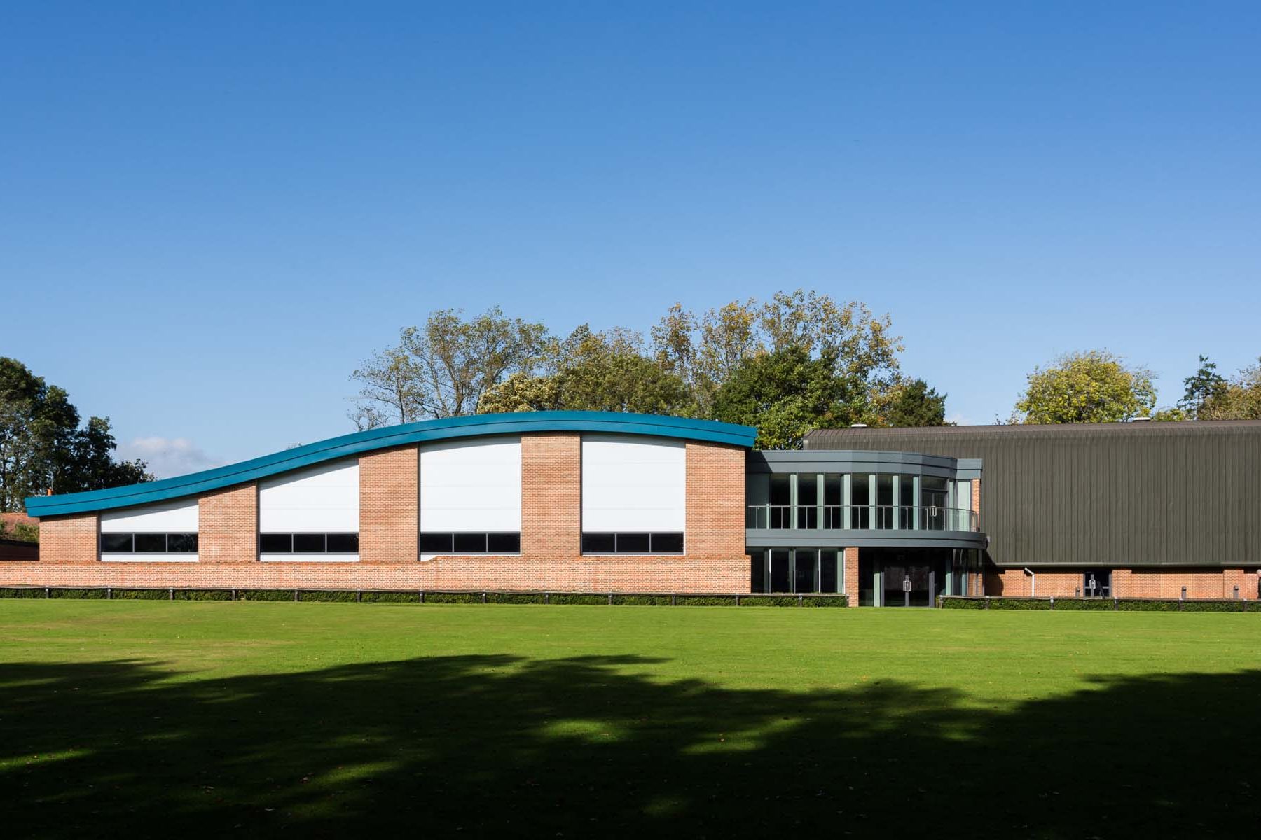 The Oratory School - New red brick swimming pool, gym and hospitality areas